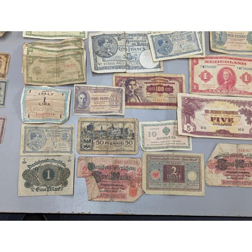 525 - Mixed world coins and banknotes to include Republic of China ten Cash, 1917 10 Milliemes, 1877 Quart... 