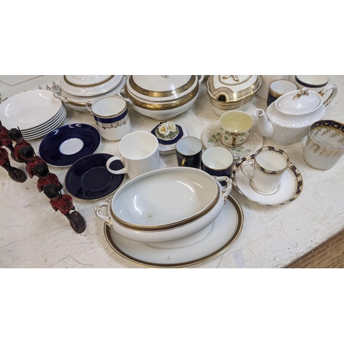 302 - A mixed lot to include a Belleek cup and saucer, painted model soldiers and mixed 19th century and l... 