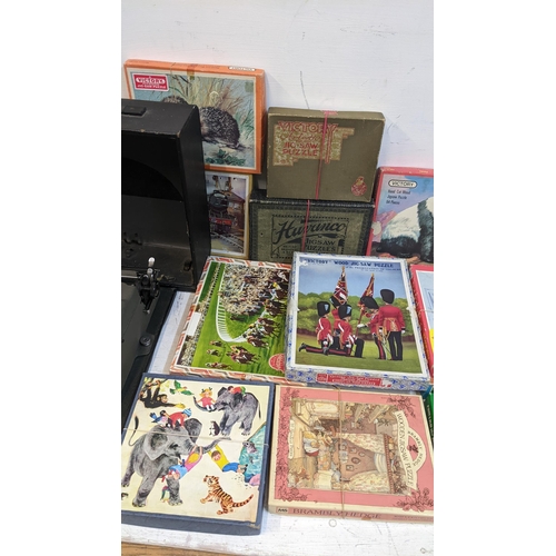 304 - A selection of boxed puzzles to include Bramley Hedge, Victory and others, together with an Imperial... 