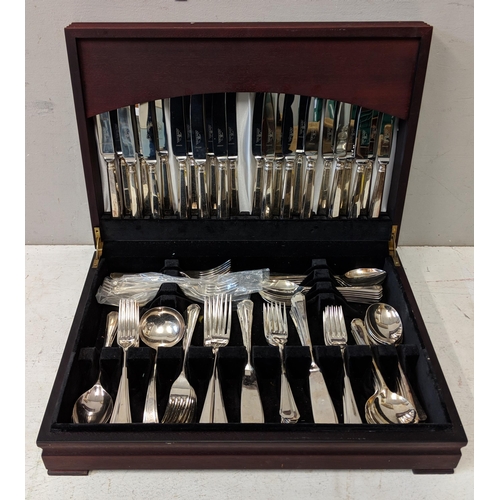 513 - A silver plated twelve-place setting canteen of cutlery in a mahogany finished case Location:A1M