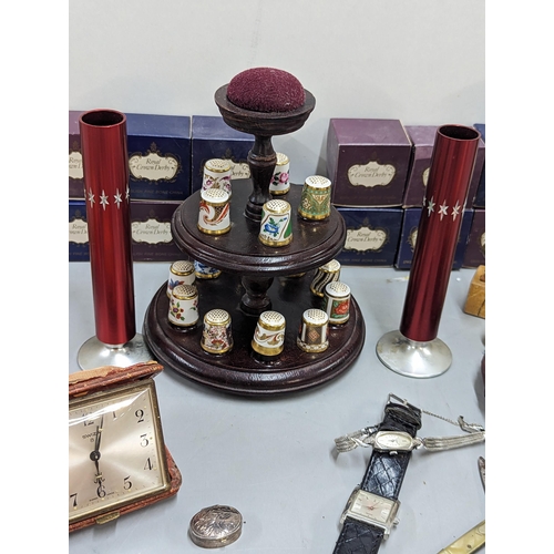 552 - Mixed collectables to include a collection of Royal Crown Derby thimbles, dolls, wristwatches, and o... 