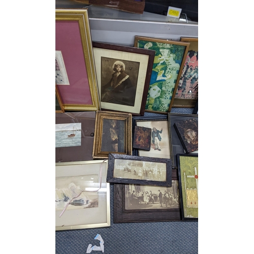 586 - Mixed pictures to include a watercolour depicting a lady with a stick, various prints, reproduction ... 