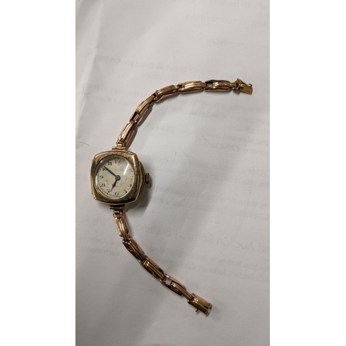 113 - An early 20th century Rotary 9ct gold manual wind wristwatch on a yellow metal expanding bracelet 19... 