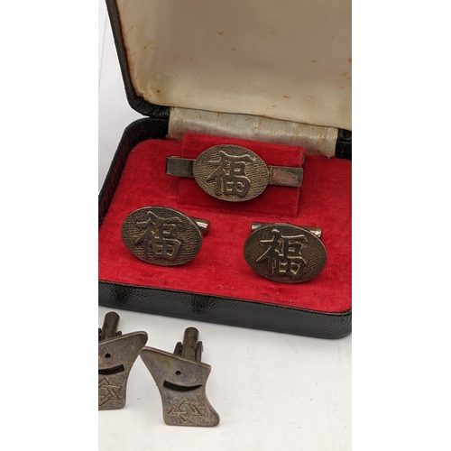 124 - Mixed Middle Eastern and Oriental white metal cuff links and tie clips total weight 37.3g
Location: