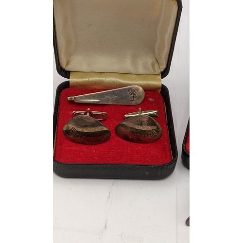 124 - Mixed Middle Eastern and Oriental white metal cuff links and tie clips total weight 37.3g
Location: