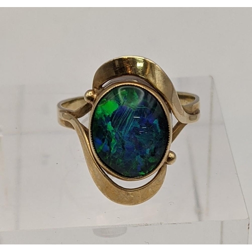 128 - A yellow metal and opal ring tested as 9ct gold total weight 32g
Location: CAB17