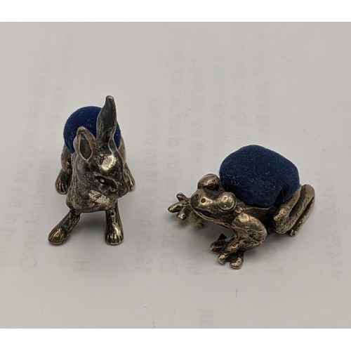 131 - Three silver pin cushions fashioned as an elephant, a frog and a rabbit, total weight 51.2g
Location... 