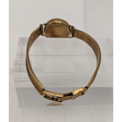 134 - A 9ct 20th century ladies 9ct gold manual wind wrist watch on a 9ct gold bracelet total weight 16g
L... 