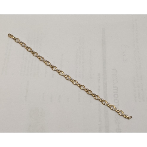 135 - A 9ct gold and diamond infinity loop bracelet total weight 4.6g
Location: CAB5