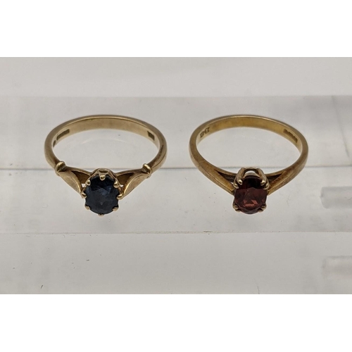 139 - Two 9ct gold rings one set with a blue sapphire and the other a red garnet, total weight 4.5g
Locati... 