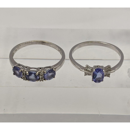 140 - Two white gold and Tanzanite rings to include an 18ct white gold ring set with a central tanzanite f... 