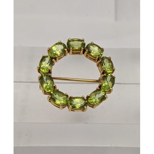 141 - A 9ct gold and peridot bar brooch, total weight 5.1g
Location: CAB3