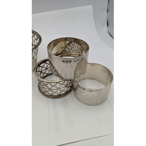 142 - Silver compromising of three napkin rings, a pierced bowl, along with a bracelet having engraved dec... 