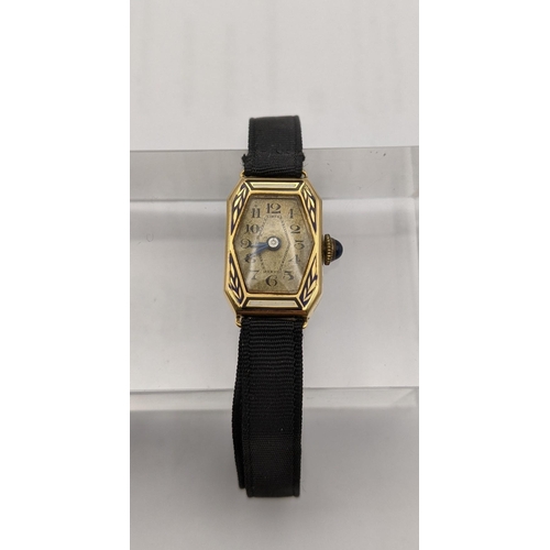 145 - A 18ct gold ladies Art Deco manual wind wrist watch on a fabric strap
Location: CAB5