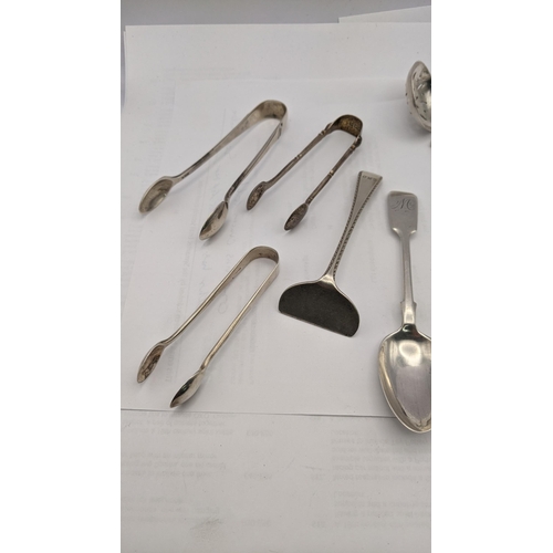 150 - Silver o include four sugar tongs, a sifter spoon, fork, spoon a pusher and a silver handled picked ... 