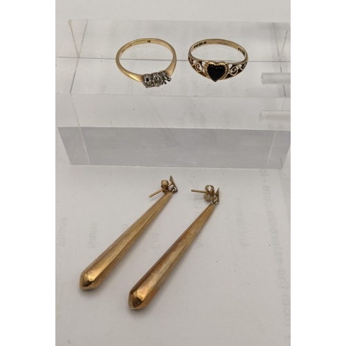 154 - A 9ct gold ring set with a heart shaped stone, a pair of pendant earrings 2.75g and an 18ct gold and... 