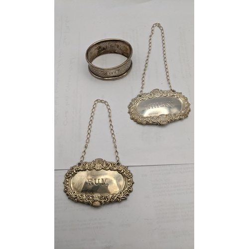 162 - Silver to include four decanter labels and two napkin rings, total weight 80.2g
Location: