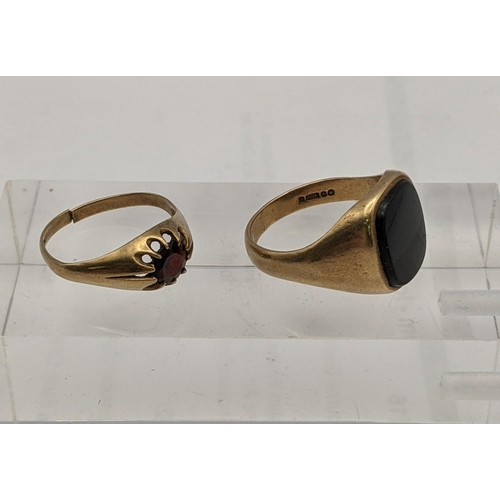 163 - A 9ct gold signet ring and another set with a garnet 8.5g
Location: CAB5