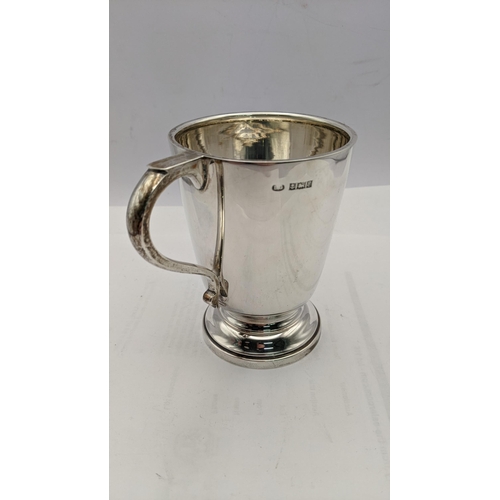 183 - A silver cup having engraved entails hallmarked Birmingham 1954 total weight 208g
Location: