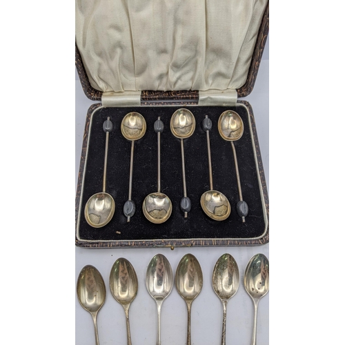 193 - A boxed set of six silver coffee spoons together with a set of six silver tea spoons, total weight 8... 