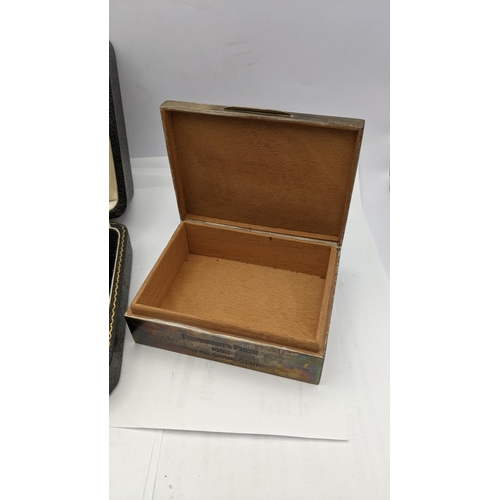 201 - A silver machine turned box along with silver egg cup and spoon in a case 
Location: