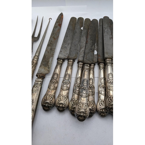 220 - A selection of embossed silver handled flatware together with a silver handled button hook and shoe ... 