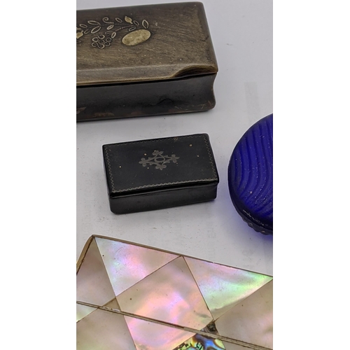 225 - A mixed lot to include two mother of pearl card cases together with a silver napkin ring, along with... 