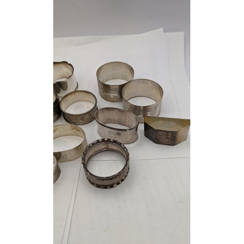 240 - A quantity of silver and white metal napkin rings, total weight 328.9g
Location: