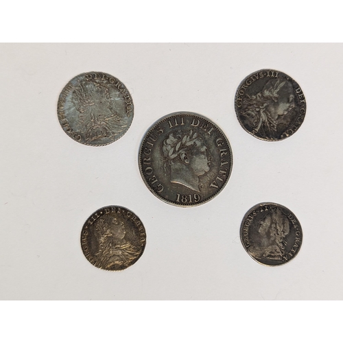 401 - United Kingdom - mixed Georgian silver coinage to include 1819 half crown, pair of 1787 shillings, 1... 