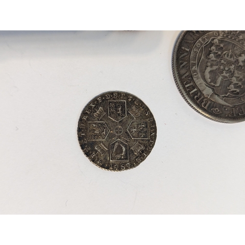 401 - United Kingdom - mixed Georgian silver coinage to include 1819 half crown, pair of 1787 shillings, 1... 