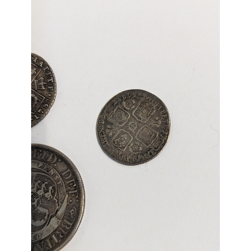 401 - United Kingdom - mixed Georgian silver coinage to include 1819 half crown, pair of 1787 shillings, 1... 