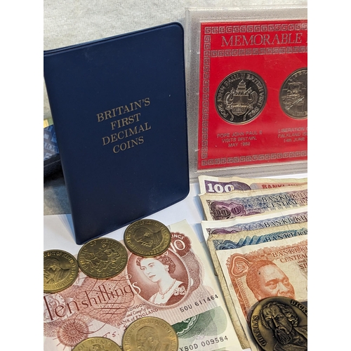 402 - Mixed coins - British and World coins and banknotes to include commemorative crowns, 1976 Concorde e... 