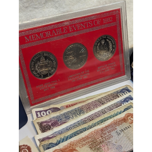 402 - Mixed coins - British and World coins and banknotes to include commemorative crowns, 1976 Concorde e... 