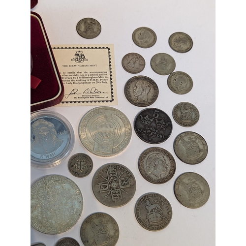 403 - Mixed coins - a collection of early 20th century British florins, shillings, sixpence and threepence... 