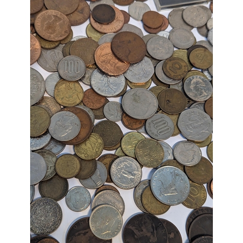 406 - Mixed coins - a large collection of British and World coins to include George I (1714-1727), shillin... 