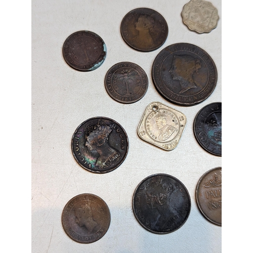 415 - British 19th century Colonial and later coins to include George III 1803 East India Company XX cash,... 