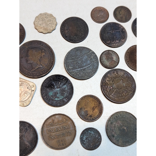 415 - British 19th century Colonial and later coins to include George III 1803 East India Company XX cash,... 