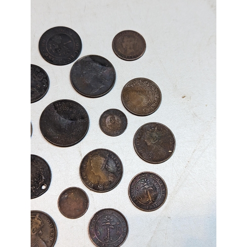 415 - British 19th century Colonial and later coins to include George III 1803 East India Company XX cash,... 