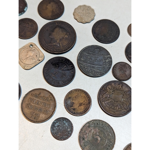 415 - British 19th century Colonial and later coins to include George III 1803 East India Company XX cash,... 