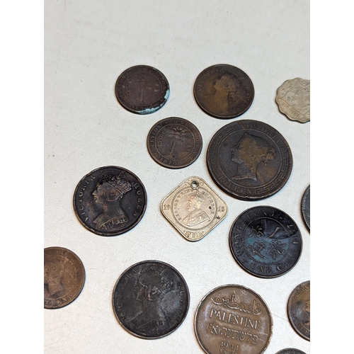 415 - British 19th century Colonial and later coins to include George III 1803 East India Company XX cash,... 