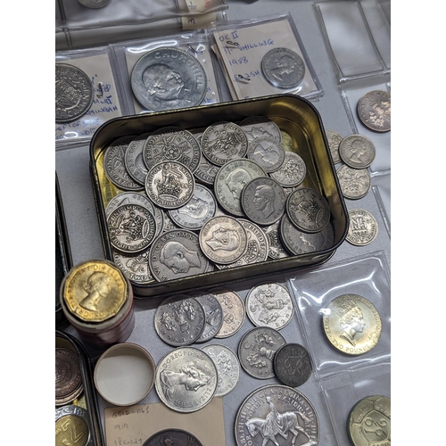 487 - A large collection of British and world coins to include Victorian and later pennies, a quantity of ... 