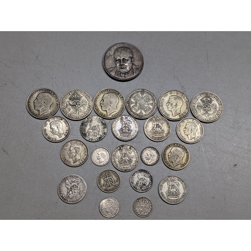 489 - British coins - a small group of pre-1947 florins, shillings, sixpence and threepence, along with a ... 