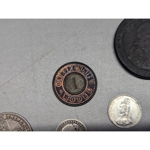 490 - Mixed coins of interest to include a possibly uncirculated 1887 threepence, George II 1745 shilling,... 