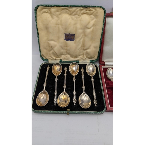 70 - Two cased sets of teaspoons to include six apostle and others, total weight 134.3g Location: