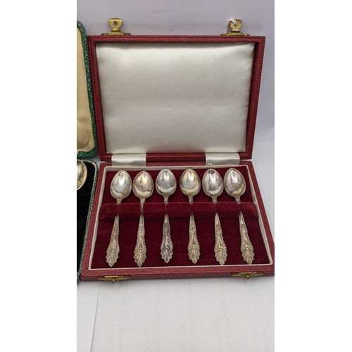 70 - Two cased sets of teaspoons to include six apostle and others, total weight 134.3g Location: