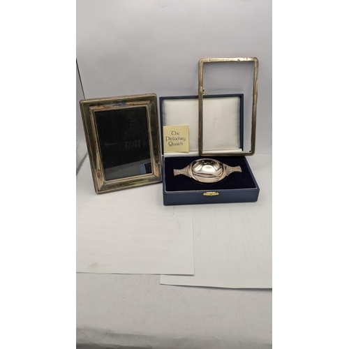 71 - A silver quaich, a modern silver photograph frame and the front of an early 20th century photograph ... 