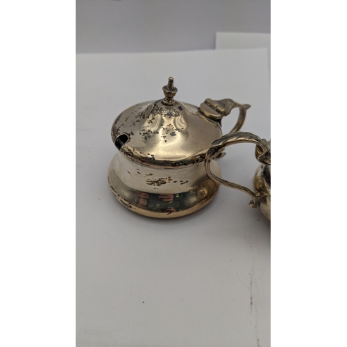 74 - Three silver condiments to include two mustard pot and a salt, total weight 149.6g
Location: