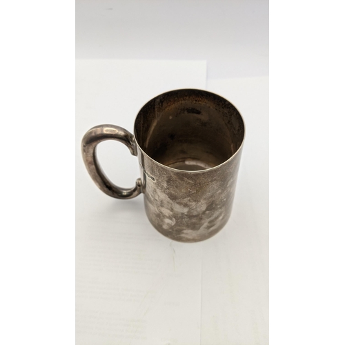 77 - A silver Sheffield 1936 christening tankard total weight 228g
Location: