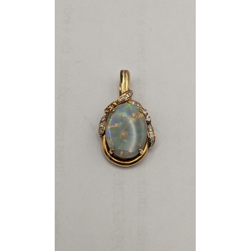 89 - A 15ct gold pendant set with a large oval opal and diamonds, 5.1g
Location: CAB5