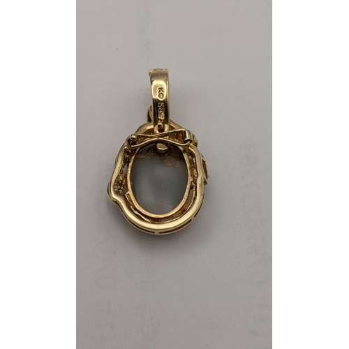 89 - A 15ct gold pendant set with a large oval opal and diamonds, 5.1g
Location: CAB5